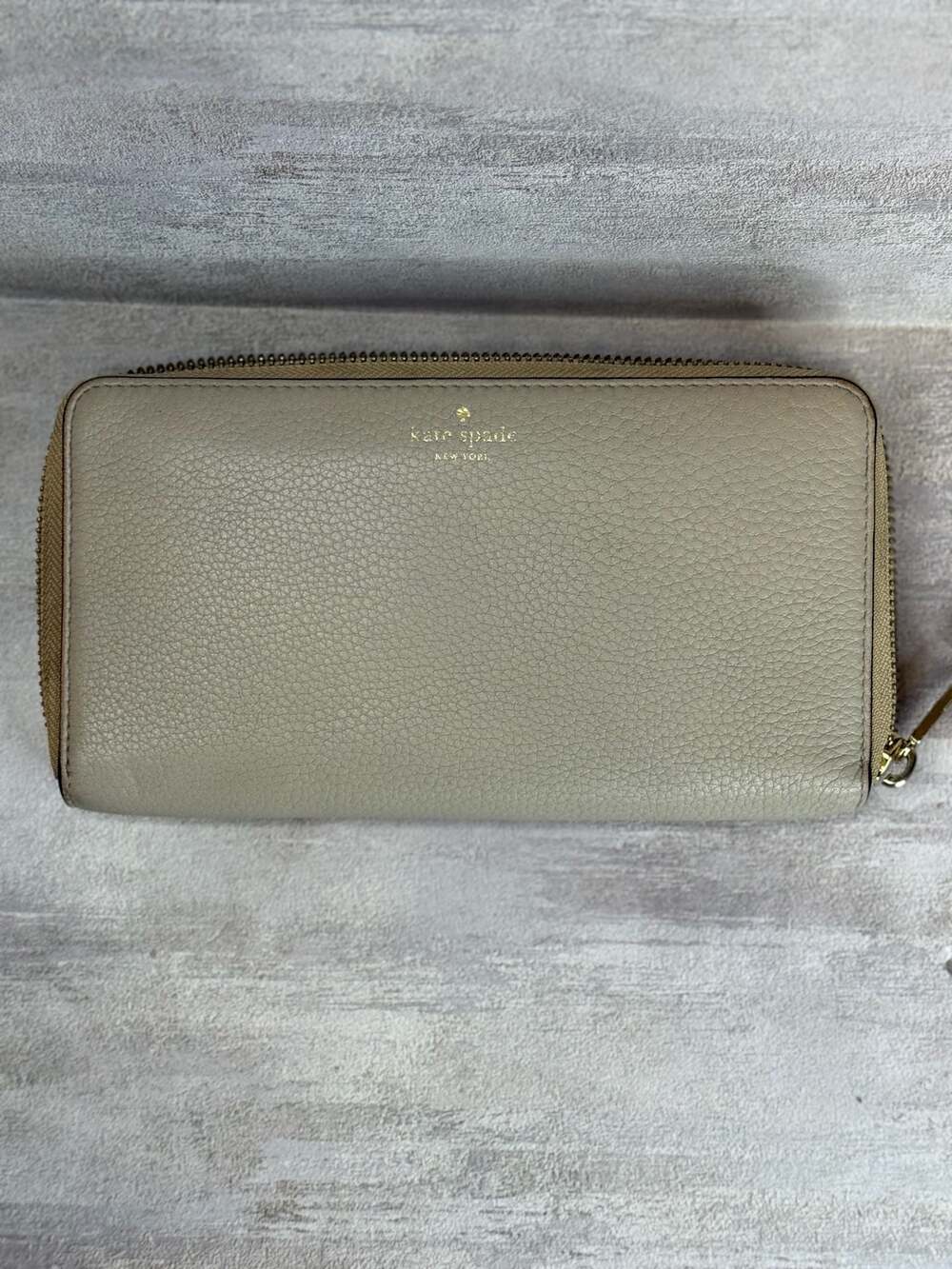 Kate Spade New York Pebbled Leather Zip-Around Long Wallet in Taupe